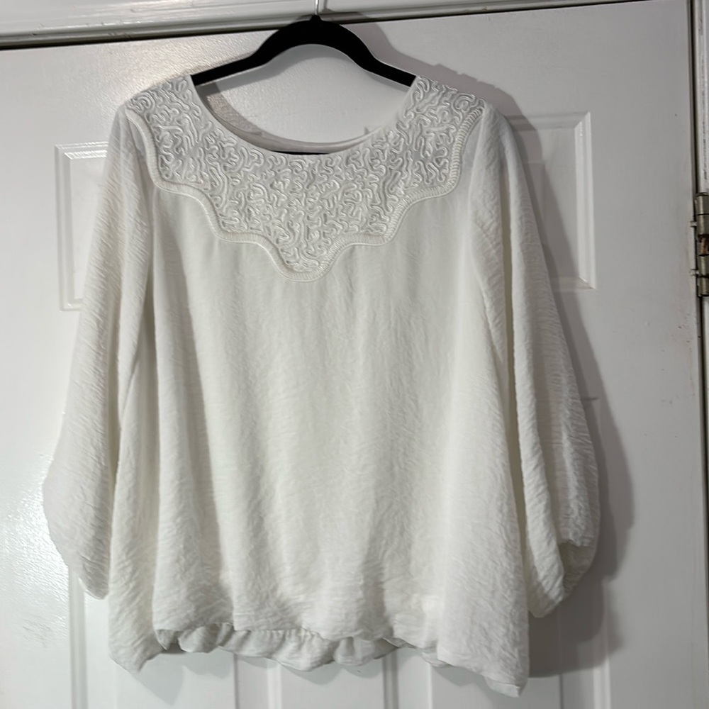 Chicos brand top. Size 14 length is 22 inches. Chest is 23 inches.